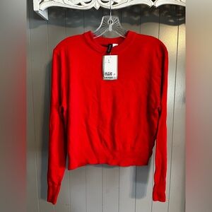 Divided Red sweater new with tags